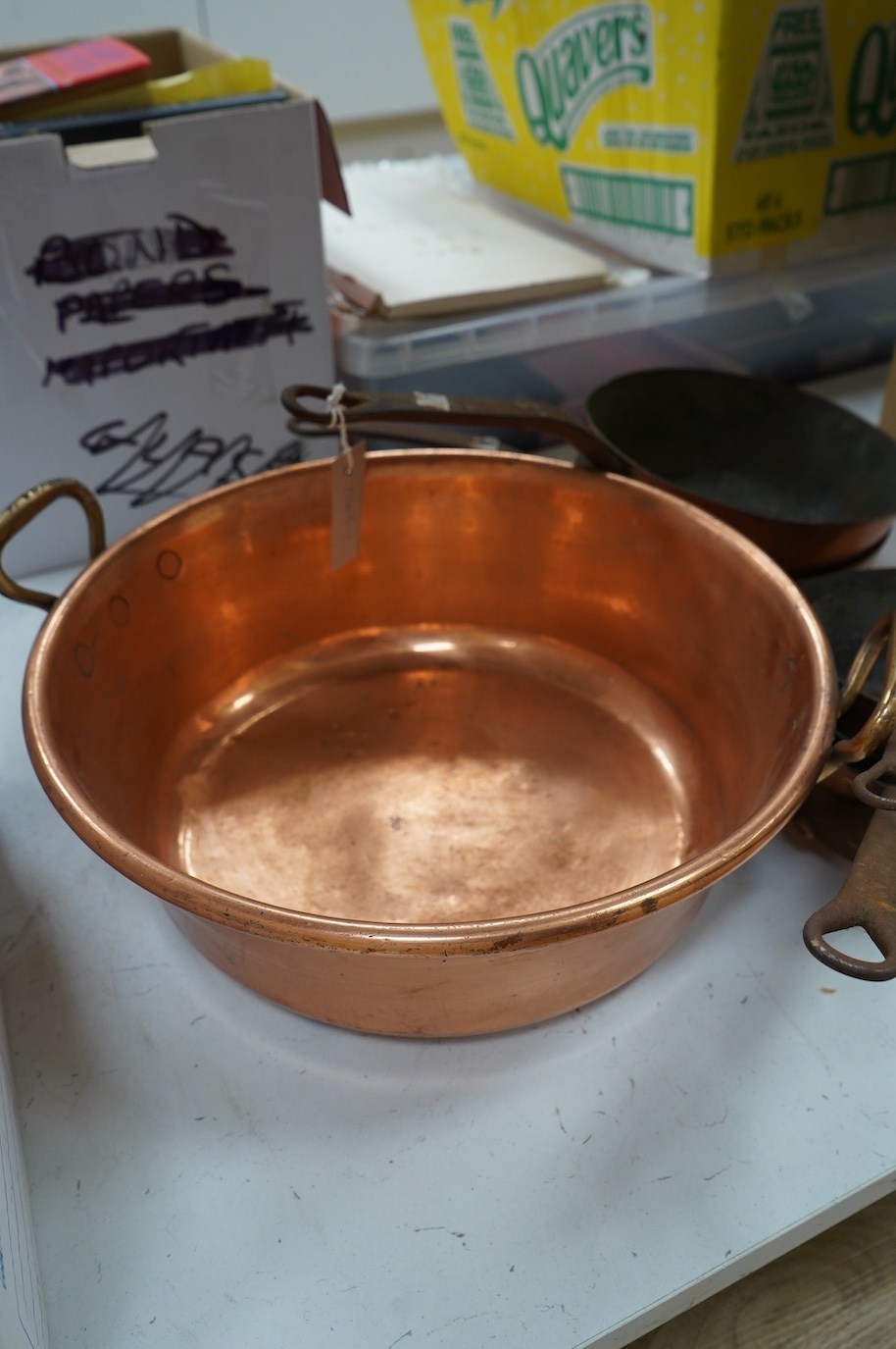 A set of five graduated copper cooking pans by E. Dehillerin of Paris, together with a copper preserve pan, 45cm. Condition - poor to fair